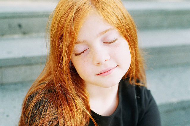 girl beaming