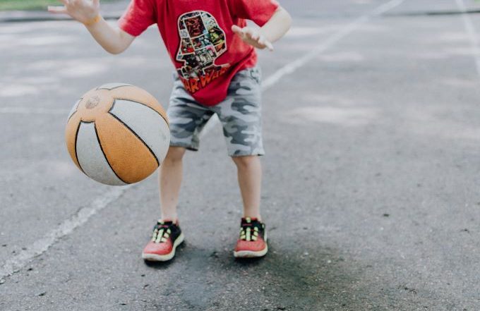 kid-dribbling-basketball